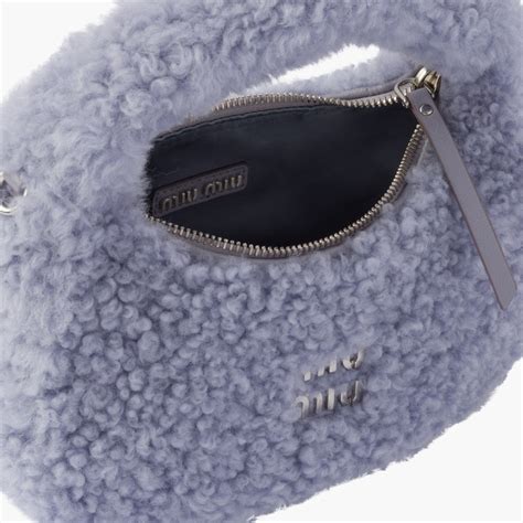 Miu Wander shearling mini hobo bag .